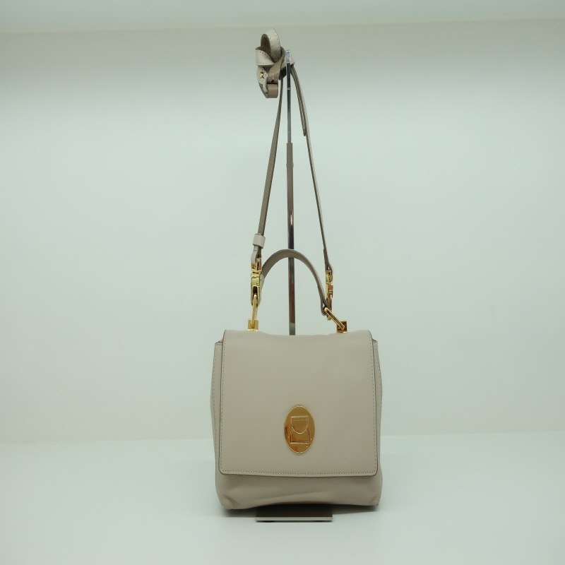 코치넬리 CNEL LIYA SEASHELL/TAUPE
